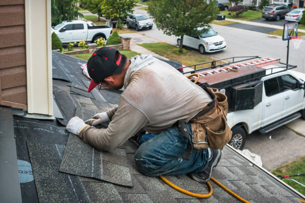 Professional Roofing technician working in New Town, ND